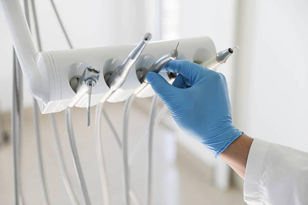Professional Root Canal Treatment technician working in Newtown, OH